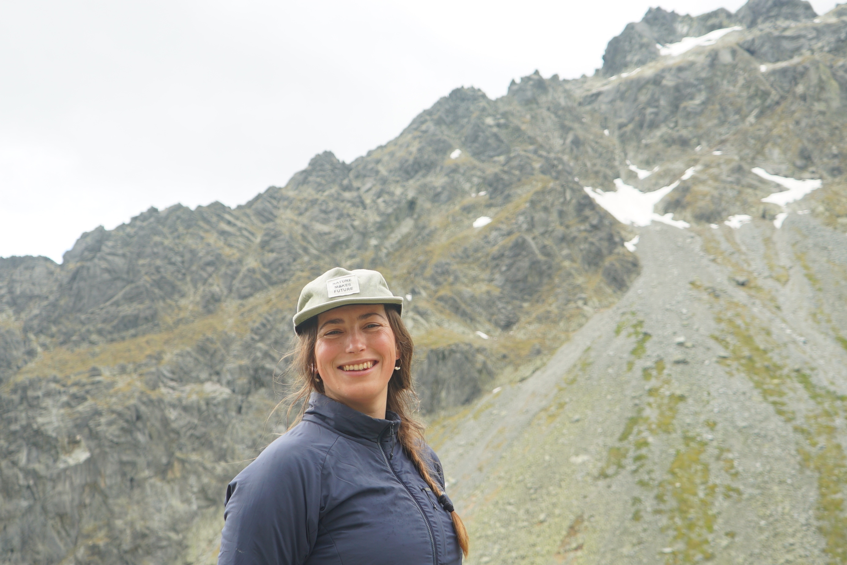 Kristína Turčanová smiling, with the High Tatras behind her